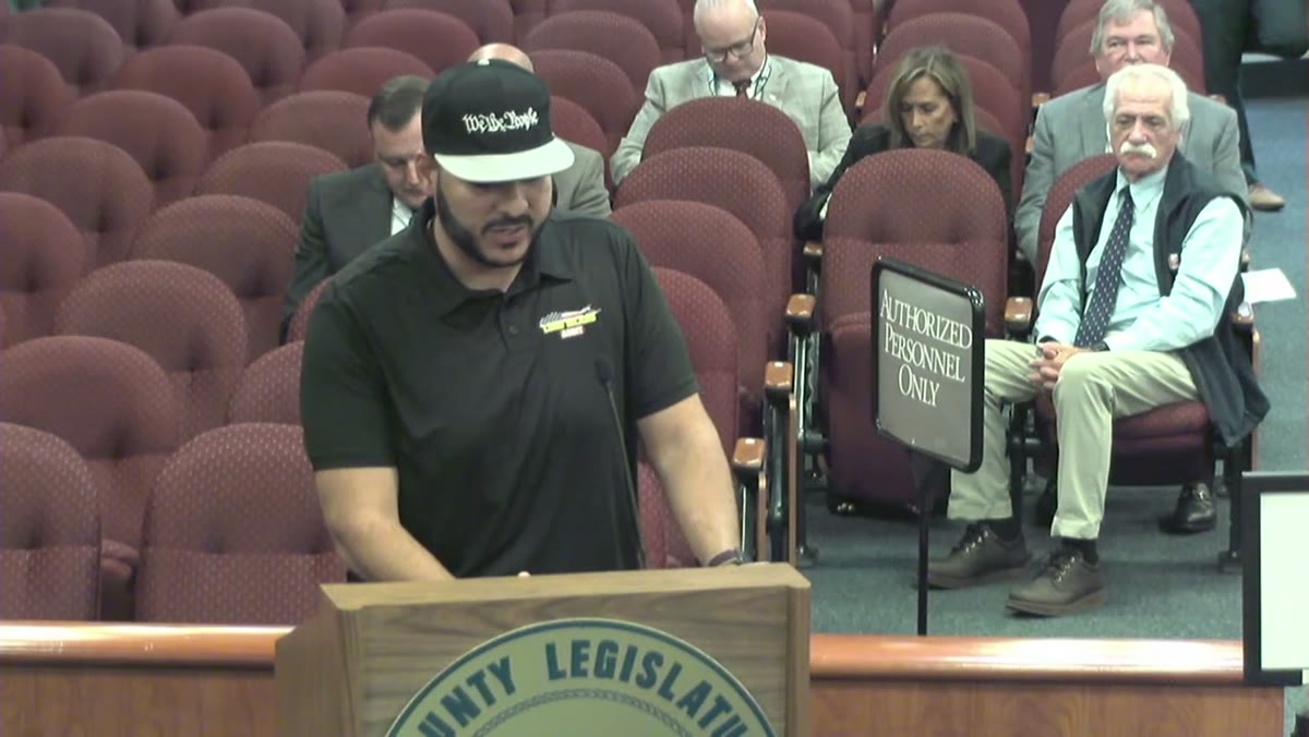 A frame from the Suffolk County Legislature meeting recording